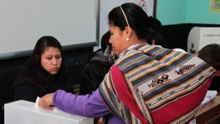 A woman casts her vote in Cuzco, Peru