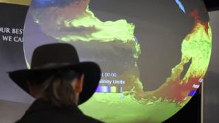 Man visiting the US pavilion at the COP21 climate change conference