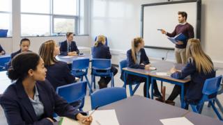 Students and teacher in classroom