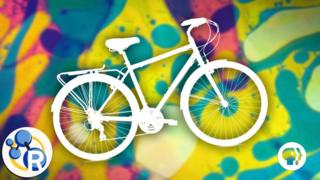 Bicicleta sobre un fondo de colores