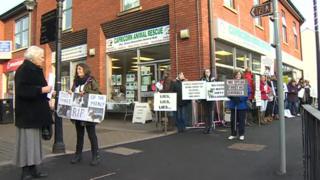 Protestors outside the Capricorn Animal Rescue shop in Mold