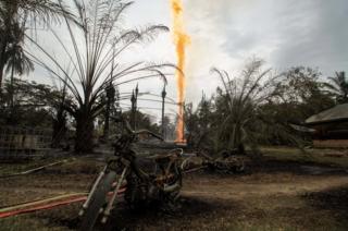 Burning oil well in Aceh