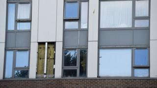 Cladding removed from tower