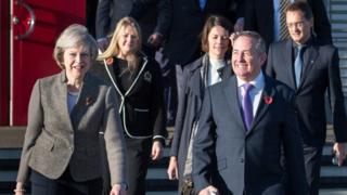 Theresa May and Liam Fox depart for India trade mission