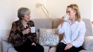 Theresa May visits first-time buyer Laura Paine
