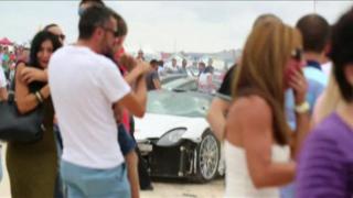 The Porsche supercar span out of control at high speed, hitting spectators