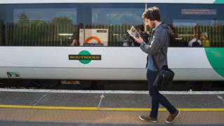 A rail passenger and a train