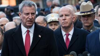New York City Mayor Bill de Blasio (left) and New York City Police Commissioner James O'Neill (right) hold a press briefing outside the New York Port Authority Bus Terminal, on 12 December 2017 in New York City.