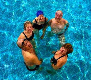 Older people in the water.