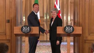 Varadkar and May shaking hands