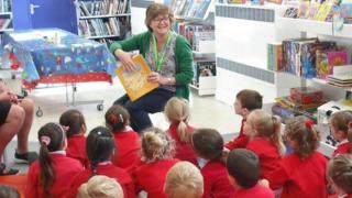 Children and staff in the Family Library