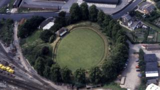 Remains of Welshpool's motte and bailey castle from the air