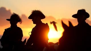 World War One re-enactors take part an Anzac Day dawn service in Australia