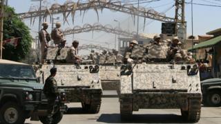 Lebanese soldiers at the scene of multiple suicide bomb attack in Lebanon