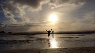 Oscar and Eden Goldman on the beach at Mawgan Porth