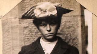 Archive mugshot of a woman