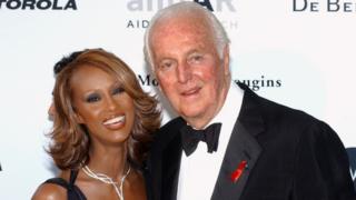 French fashion designer Hubert de Givenchy pictured with Somali-born model Iman in May 2002