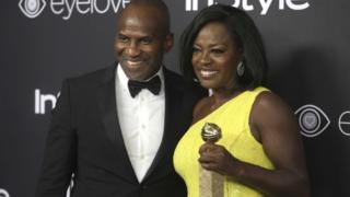 Viola Davis, who won a Golden Globe Award for Best Supporting Actress in the film "Fences" with husband Julius Tennon.