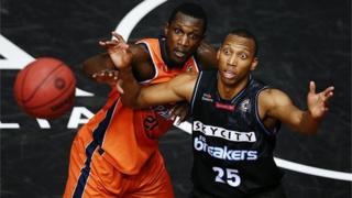 JANUARY 26: Akil Mitchell of the Breakers looks to catch a pass against Nnanna Egwu of the Taipans during the round 17 NBL match between the New Zealand Breakers and the Cairns Taipans at the North Shore Events Centre on January 26, 2017 in Auckland, New Zealand.