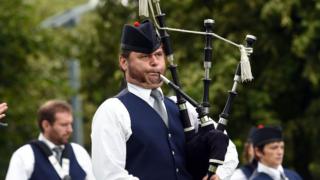 Man playing the bagpipes
