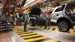 Range Rovers and Land Rovers on the production line