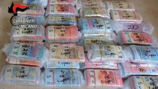 Part of the money and drug confiscated by Carabinieri in Milan