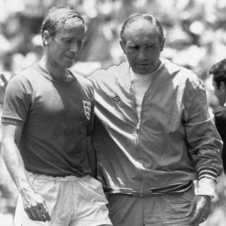 Bobby Charlton and Sir Alf Ramsey after the West Germany defeat