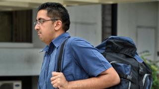 British national Yogvitam Pravin Dhokia arrives at the state court in Singapore