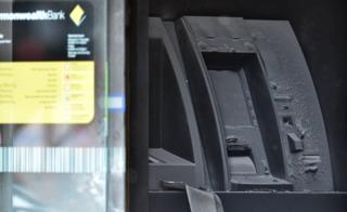 A fire-damaged cash machine at the Commonwealth Bank Springvale in Melbourne (18 November)