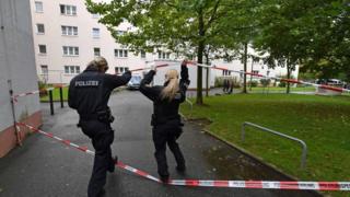 Police secure a residential area in Chemnitz, 9 October.