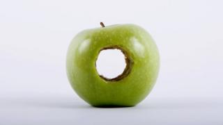 Apple with hole in it