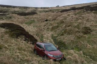 car in ravine