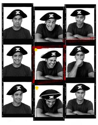 George Clooney wears a pirate hat for portraits