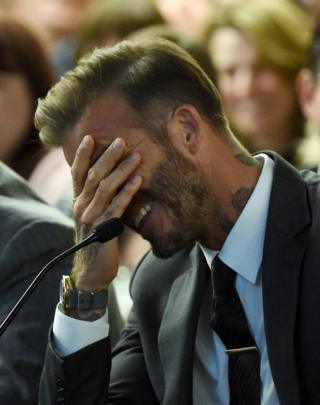 Former soccer player David Beckham laughs during a Southern Nevada Tourism Infrastructure Committee meeting with Oakland Raiders owner Mark Davis (not pictured) at UNLV on April 28, 2016 in Las Vegas, Nevada.
