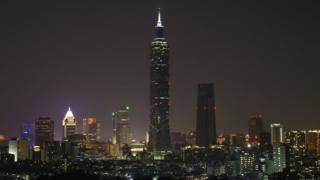 A view of the skyscaper Taipei 101 with lights-off during the Earth Hour in Taipei, Taiwan