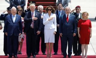 President Donald Trump (2nd L) and First Lady Melania Trump (3rd L) walk with Israeli Prime Minister Benjamin Netanyahu (2nd R), his wife Sara (R) and David Friedman (Center back), the new United States ambassador to Israel, upon their arrival at Ben Gurion International Airport in Lod near Tel Aviv, Israel May 22, 2017