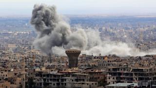Smoke rises from the besieged rebel-held Eastern Ghouta, Syria, on 27 February 2018
