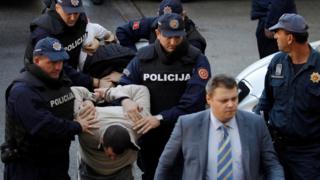 Полиция Черногории ведет арестованного мужчину
