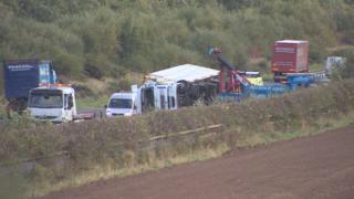 A lorry has overturned on the A1 in high winds