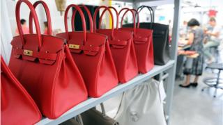 Birkin bags on shelf