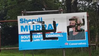 Defaced poster