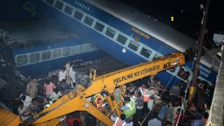 Carriages piled on top of each other after coming off the rails