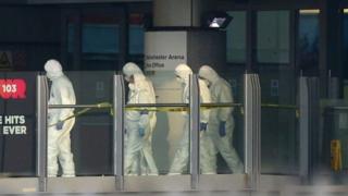 Forensic teams working at the site in Manchester