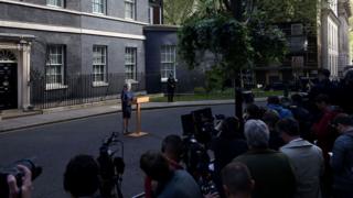 Theresa May making an announcement to media