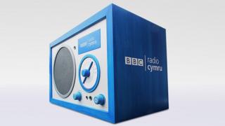 A radio with the BBC Radio Cymru logo