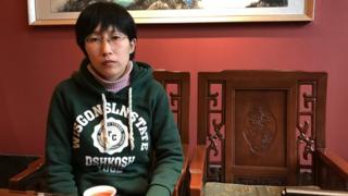 Jia Jingyuan, sister of Jia Jinglong, speaks to journalists at a restaurant in Beigaoying village on the outskirts of Shijiazhuang in north China's Hebei province, Wednesday, Oct. 26, 2016