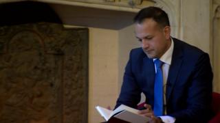 Leo Varadkar prepares to give a speech at Queen's University in Belfast