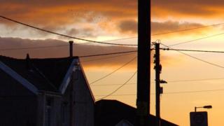 Home with telegraph pole