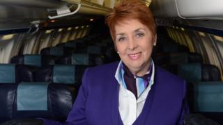 Charmaine McCall-Hagan onboard an aircraft