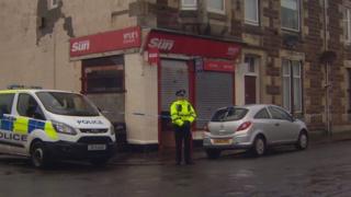 Police outside Wylie's newsagent